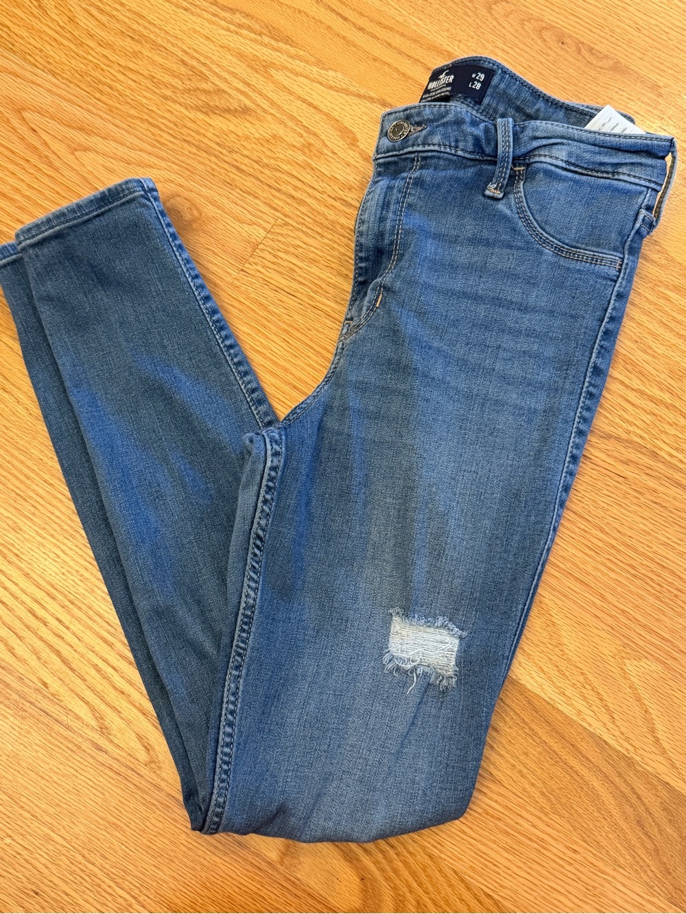 Hollister Medium Blue Women’s Skinny High Rise Jegging- Ripped Detail